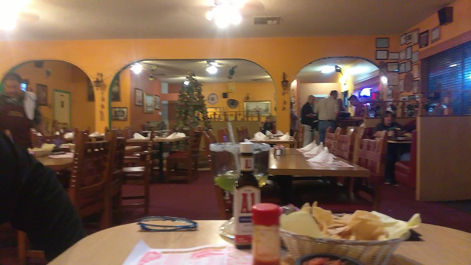 Colorful Mexican dishes on plated table service